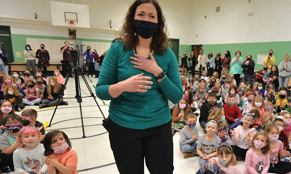 Photo of Heather Haught reacting to Milken Award announcement