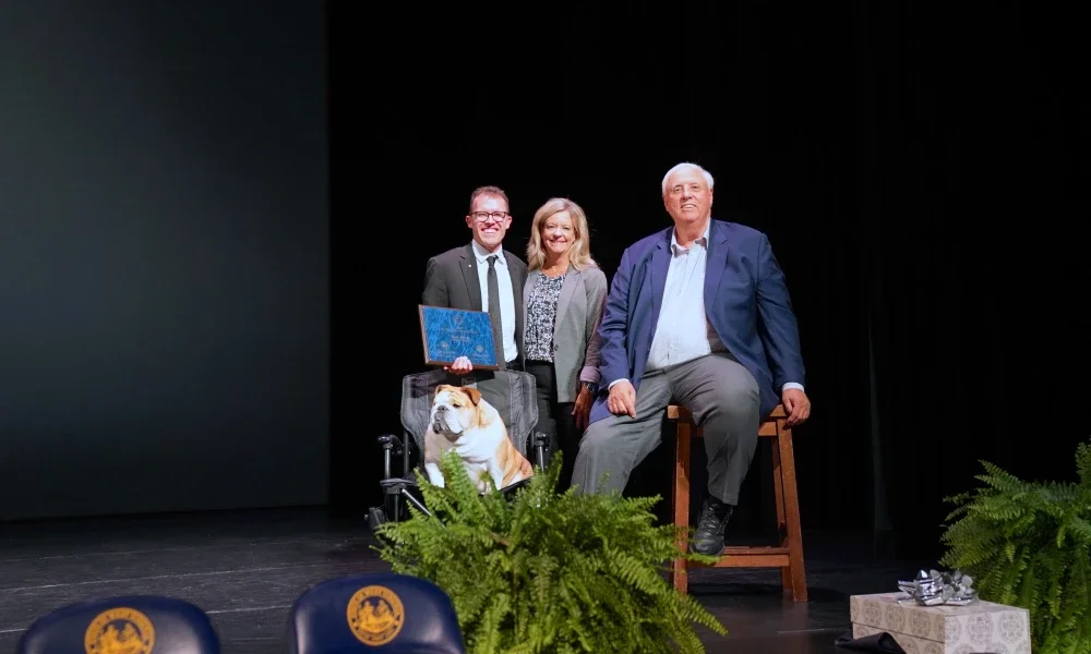 Pictured are Seth Skiles, State Superintendent of Schools Michele L. Blatt, and Governor Jim Justice posing for a photo.