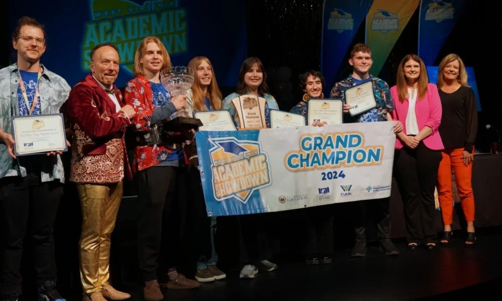 Pictured is Morgantown High School Team 1 posing for a group photo with a first-place Academic Showdown trophy.