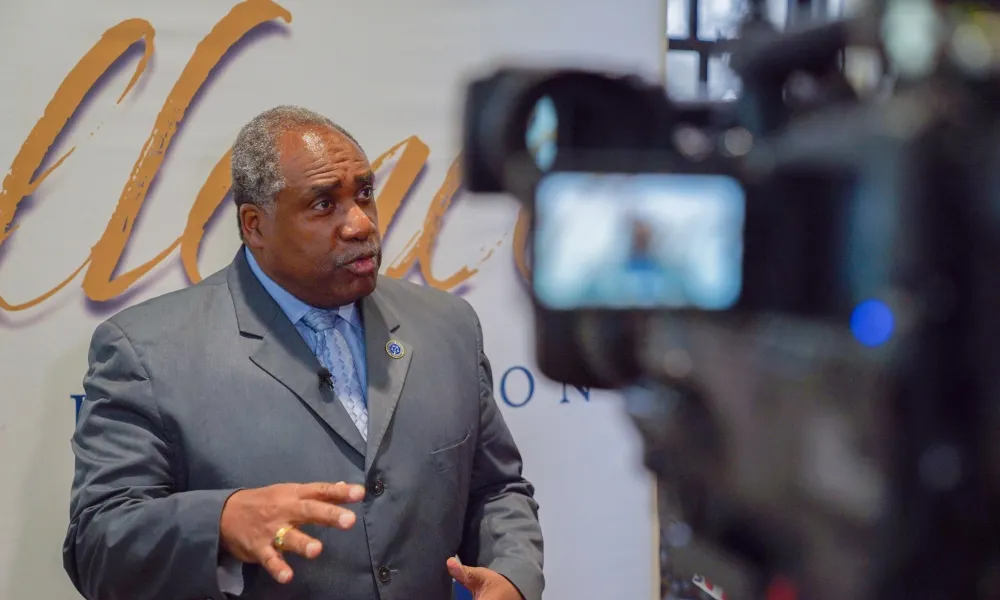 Person being interviewed on camera.