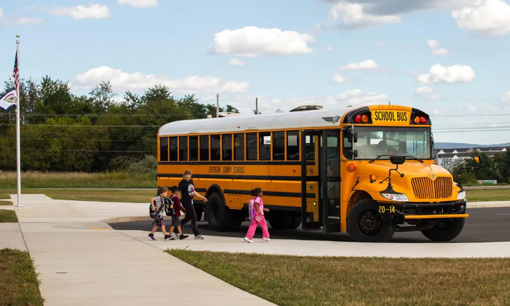 Children board a school bus in Jefferson County.
