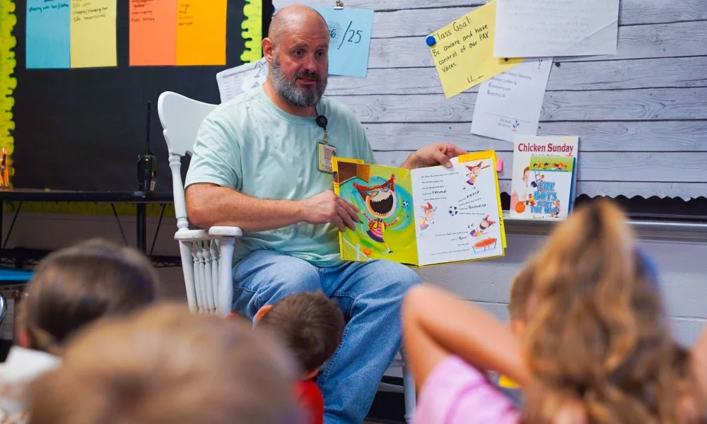 Brandon Kelley sharing a story with students.