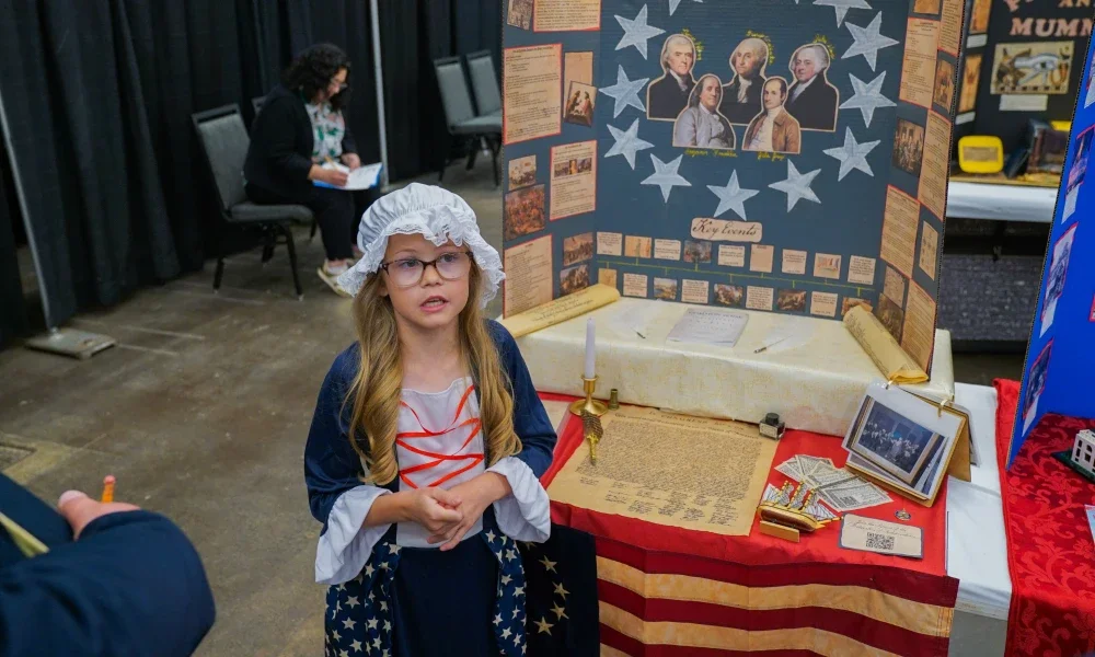 A student presenting her project. 