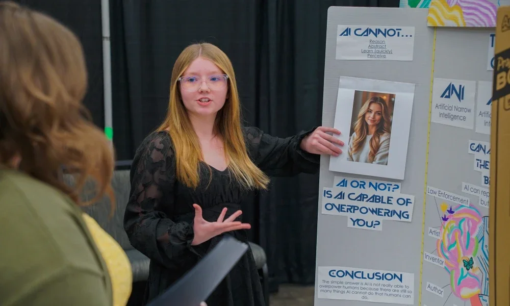 A student presenting her project. 