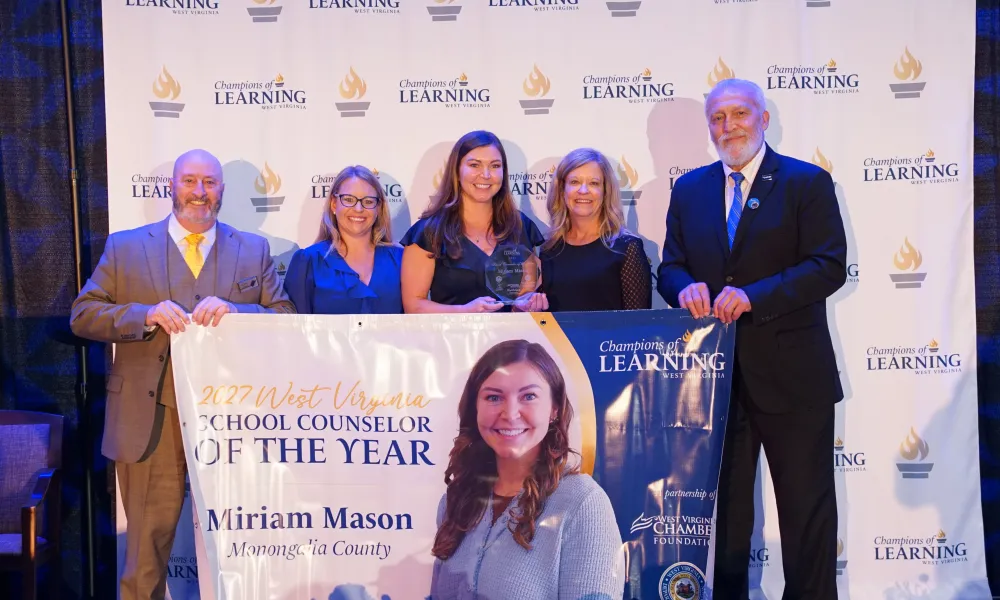 Miriam Mason and others smiling. 