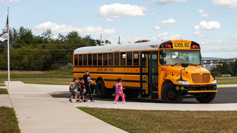 Children board a school bus in Jefferson County.