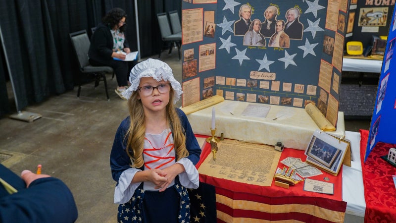 A student presenting her project. 