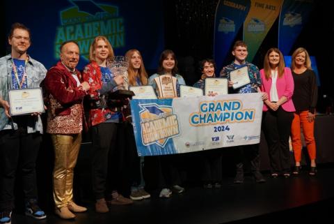 Pictured is Morgantown High School Team 1 posing for a group photo with a first-place Academic Showdown trophy.
