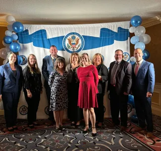 Group of people standing.