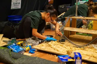 A student working on a project. 