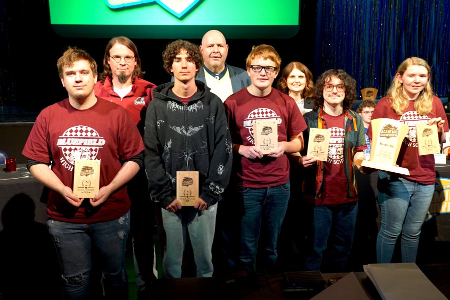 People posing for a photo.