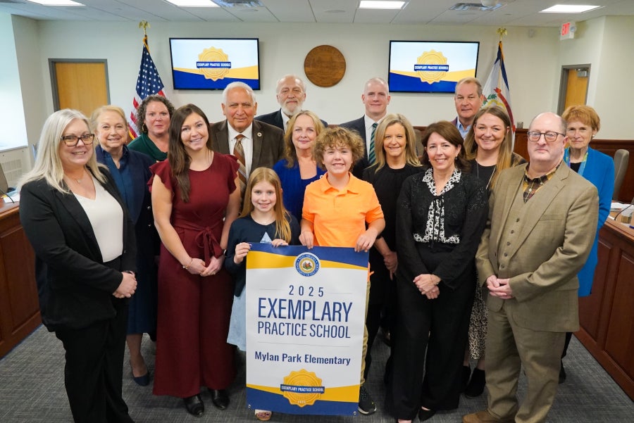 West Virginia Board of Education members posing with representatives from Mylan Park Elementary School. 2025 Exemplary Practice School Mylan Park Elementary.