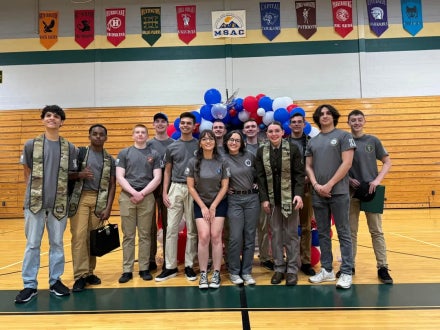 A group of students smiling.