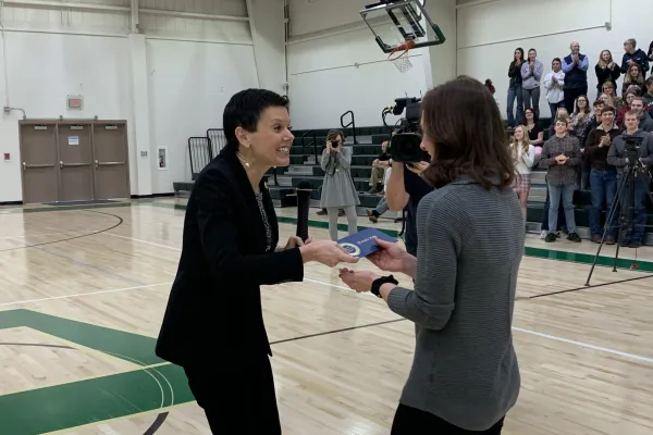 Milken Bishop Wolf reaction