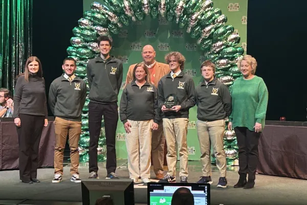Huntington high school team holding first place trophy
