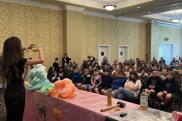 Jennifer Calendrelli performing science Experiment at the CTE Wild & Wonderful Fall 2023 Adminstrators Conference