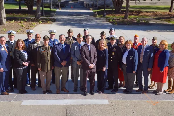 Members of the Common Ground Partnership posing together after the 2024 Compact signing