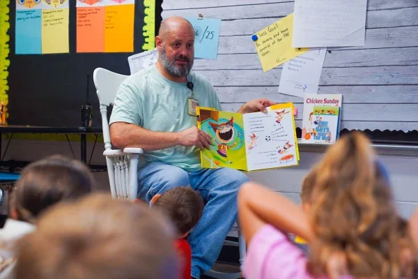 Brandon Kelley sharing a story with students.