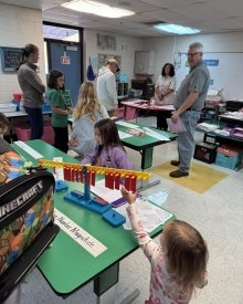 People in a classroom.