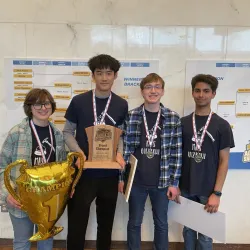 Morgantown team holding 1st place award at Academic Showdown.