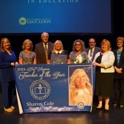 2024 Teacher of the Year Sharon Cole receiving her award