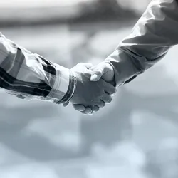 Two people shaking hands