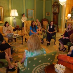 Photo of 2024 Ball Toyota Scholar event attendees conversing in a grand space at the Governor's Mansion.