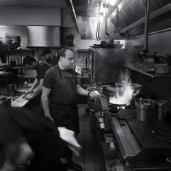Chef Paul Smith cooking in a kitchen