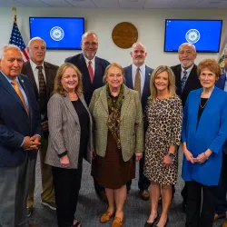 Members of the West Virginia Board of Education standing together after board meeting