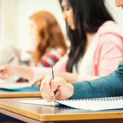 Students taking an exam.