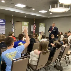 Students participate with a speaker in Youth in Government seminars.