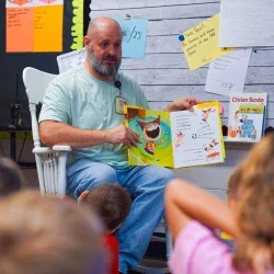Brandon Kelley sharing a story with students.