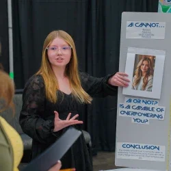 A student presenting her project. 