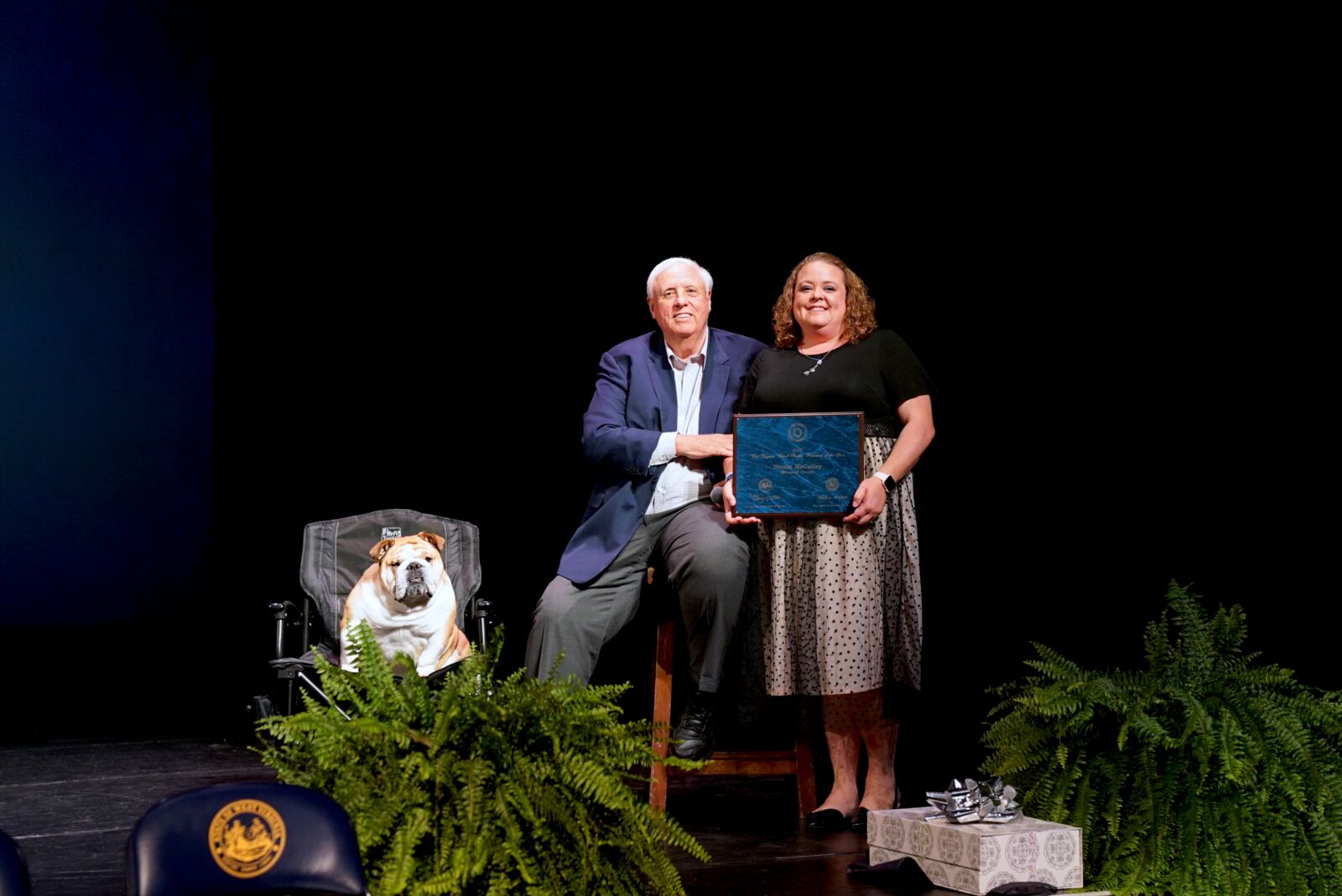 Pictured is Nicole McCulley posing for a photo with Governor Jim Justice.