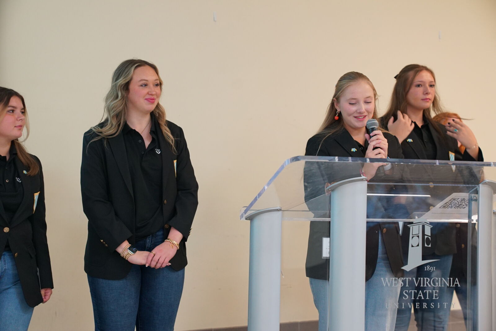 Pictured are students presenting a speech.